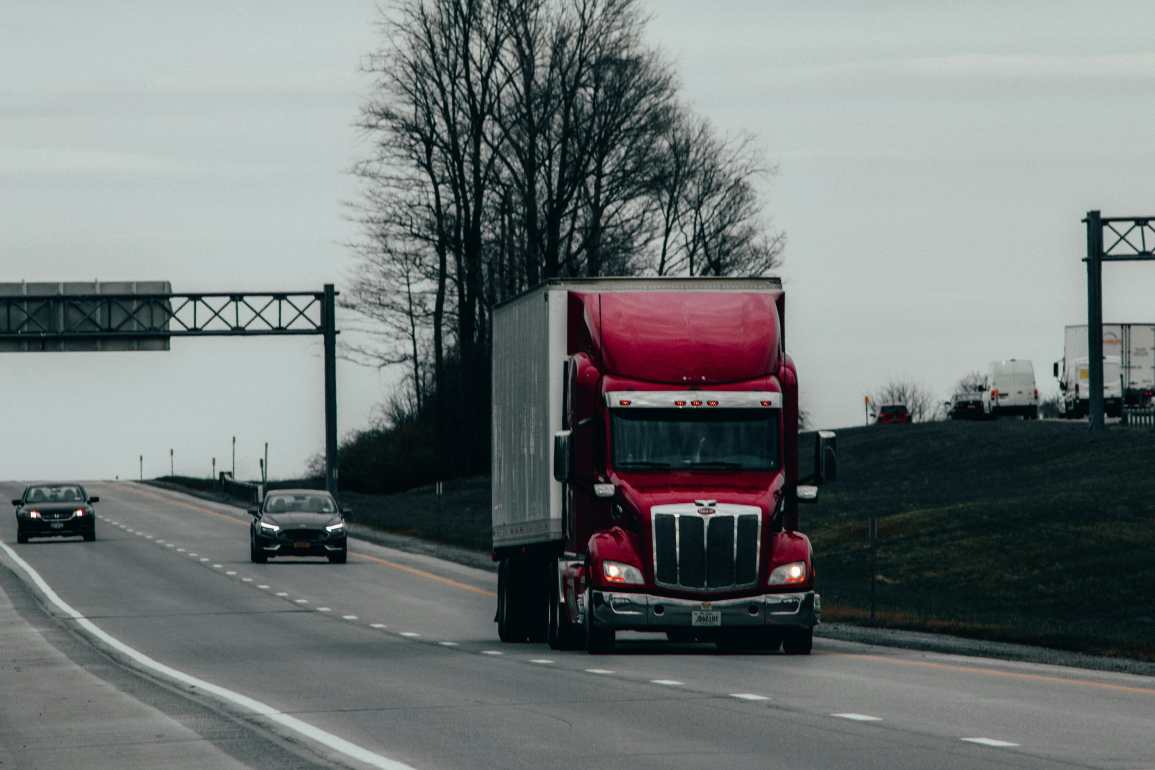 Tractor-trailer running in the right lane of a divided interstate